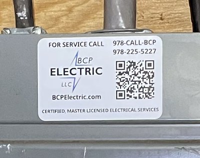 BCP Electric LLC 978-CALL-BCP sticker on electrical panel